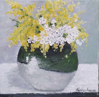 Yellow flowers in a green bowl
