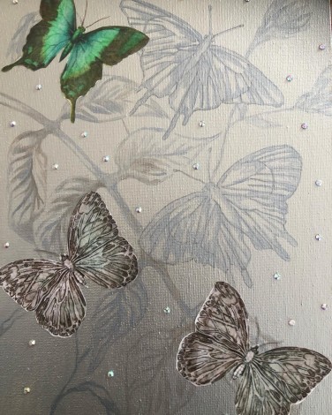 This painting is a touch of luxury. It shows 5 butterflies, 3 in collage and done painted, gliding around leaves/flowers. The flowers are subtly painted in silver and blue to blend in with the background. In between the butterflies and flowers are sparkli